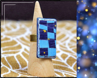 bague en papier bleu artisanale avec étoiles jaunes